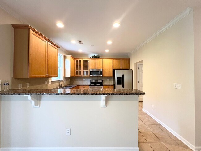 Foto del edificio - 10501 Dominion Village Dr