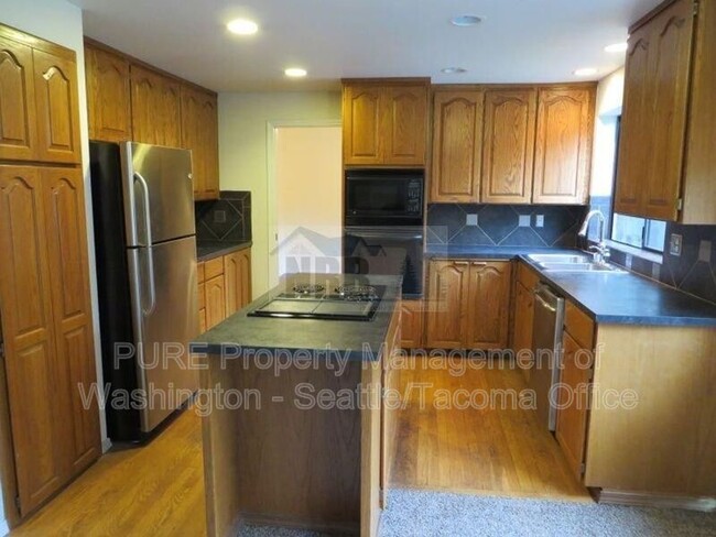 Building Photo - 702 119th St S