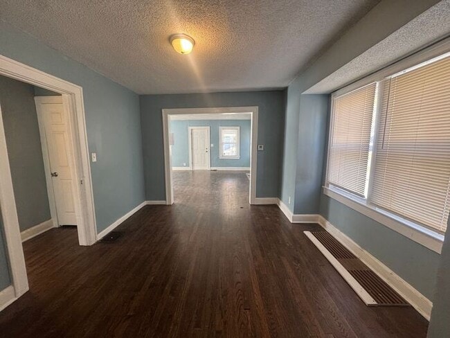 Building Photo - Charming 3BR 2BA Home w/ Fenced Yard + Covered Porch in KC