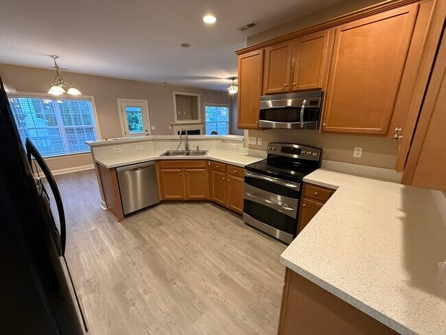 Building Photo - HUGE 5 Bedroom 3 Stroy Home with Fenced in...