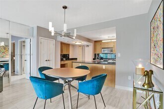 Building Photo - 10275 Collins Ave