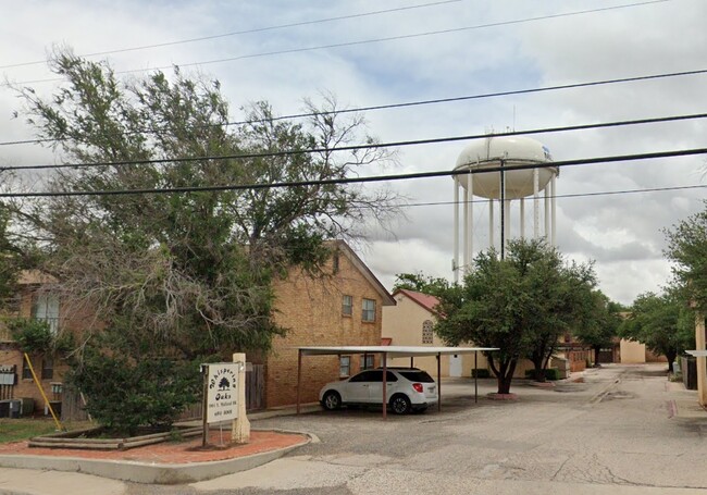 Building Photo - Whispering Oaks Apartments