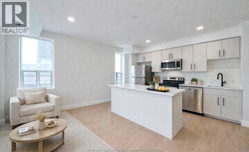 Building Photo - 267 Pelissier St