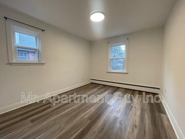Building Photo - 1148 Queen's Blvd