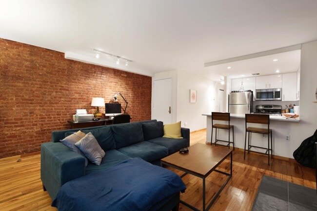 Photo - 115 W 130th St Townhome
