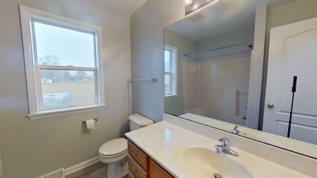 Foto del edificio - Move-In Ready 2BR Townhouse w/ Central AC & Off-Street Parking