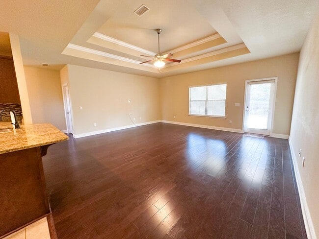 Building Photo - Well maintained 4 bedroom home with 2 car garage