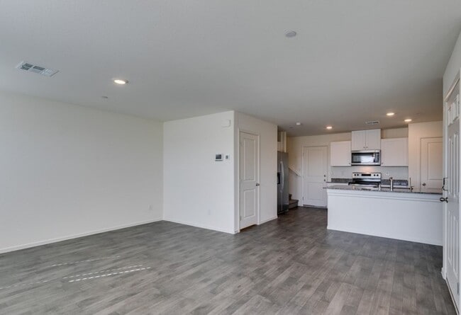 Building Photo - New townhome with attached 2 car garage.