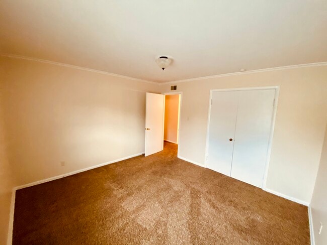 Bedroom 1 view standing in corner. - 330 Rice St