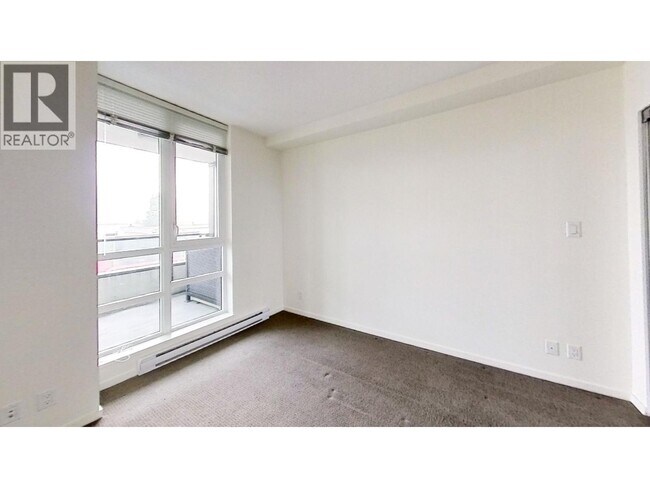 Photo du bâtiment - 7788 Ackroyd Rd