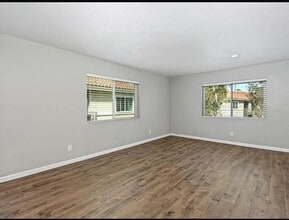 Building Photo - 7565 Charmant Dr