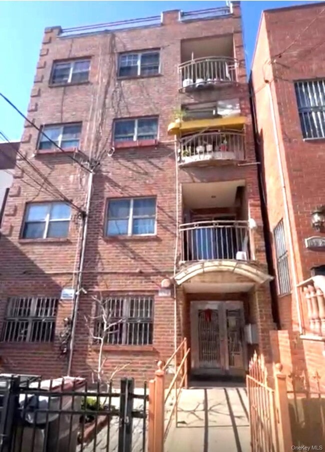 Building Photo - 104-27 38th Ave