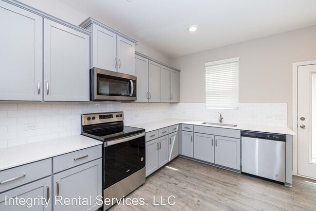 Building Photo - 3 br, 2.5 bath House - 104 S. Dorsett St
