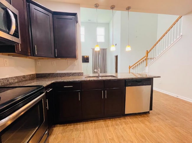 Photo - Spacious 4BR/3.5BA Townhome Minutes from Campus – Perfect for Roommates or Families