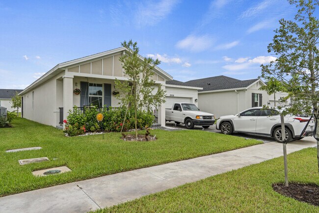 Building Photo - 8906 Dahlia Cir