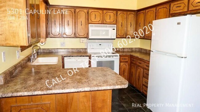 Foto del edificio - 5301 Capulin Ln