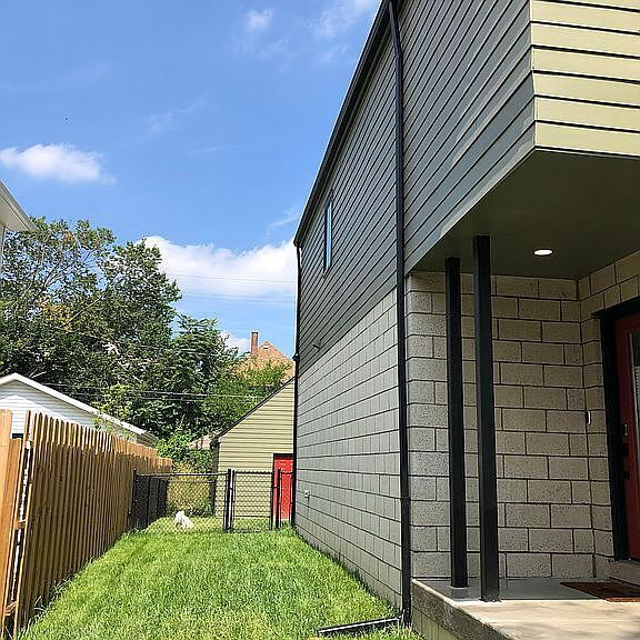 Foto del edificio - "Charming 2-Bed, 3-Bath Gem in Detroit's Heart with 1,380 Sq Ft of Comfort!"