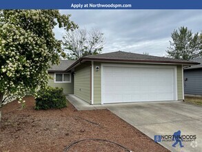Building Photo - 1409 SW Kokanee Ln