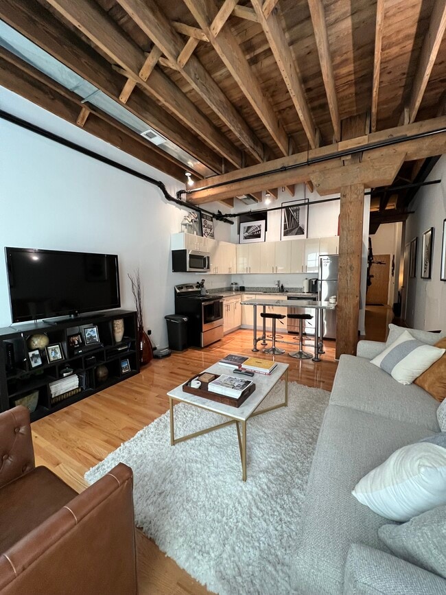 #203 KITCHEN/LIVING AREA - Brass Building Lofts