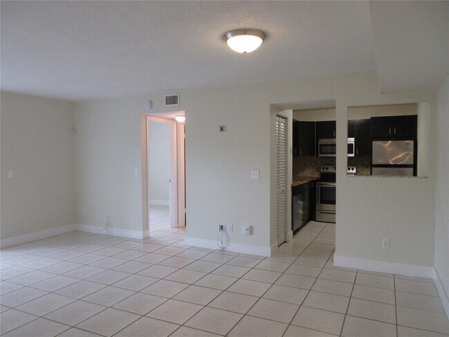 Building Photo - 10710 Royal Palm Blvd