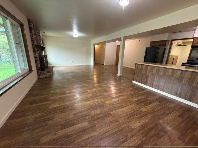 Living Room and partial kitchen - 2547 NE Holmes Rd