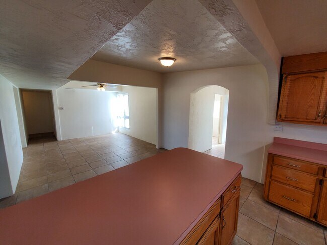 Building Photo - 4 bedrooms and 2 bathrooms with A/C.