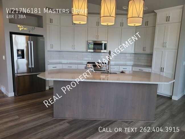 Building Photo - W217N6181 Masters Dr