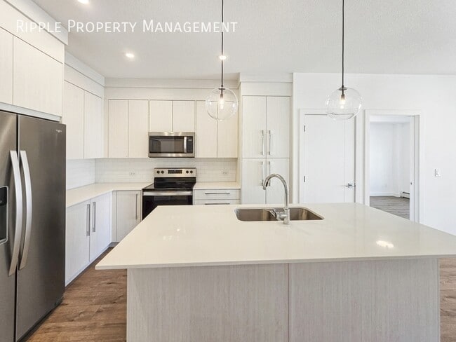 Building Photo - MODERN & SPACIOUS 2 BEDS, 2 BATHS CONDO UNIT | UNDERGROUND PARKING & PET SPA IN SAVANNA II