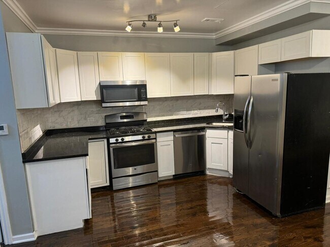 Foto del edificio - 5852 S Prairie Ave