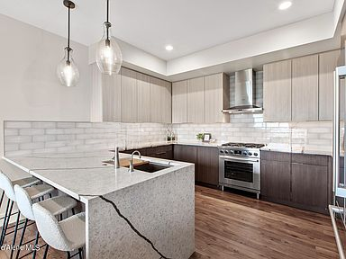 Building Photo - luxury condo living in the heart of one of...