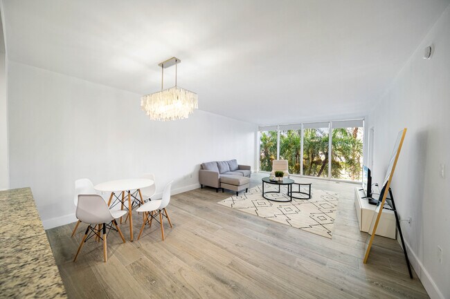 Building Photo - 10275 Collins Ave