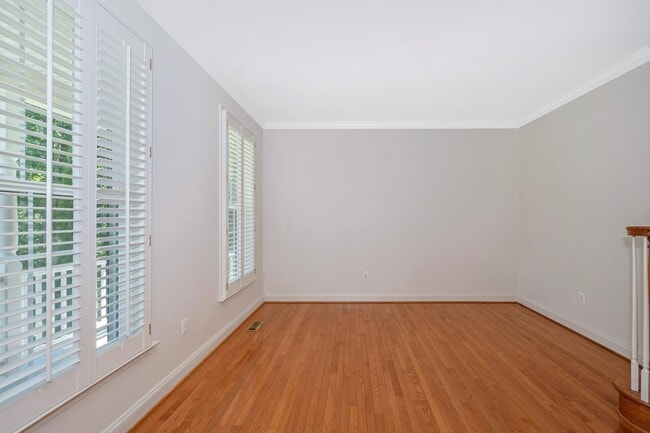 Building Photo - Main Level Primary Suite & Soaring Two Story Family Room