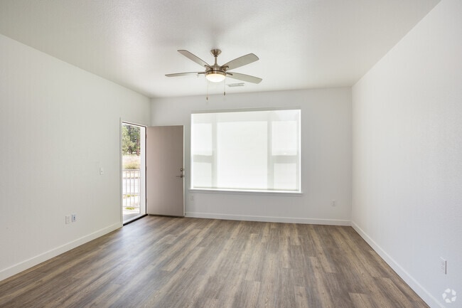 3BR, 2BA - 1,230SF - Living Room - Pine Ridge Crossings