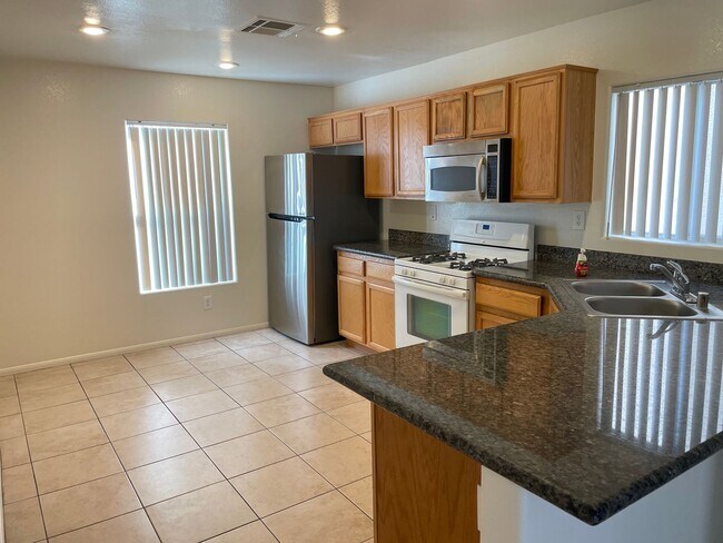 Building Photo - 5038 W Desert Dandelion Ct
