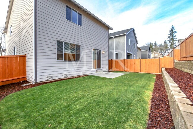 Building Photo - Elegant 4BR Covington Rental with Chef’s K...
