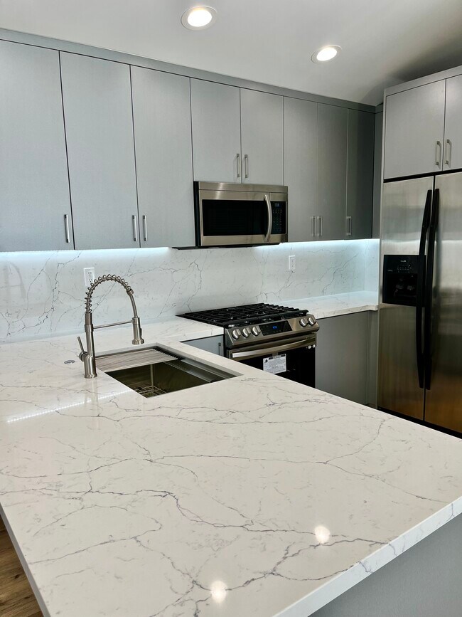 Kitchen Island under cabinet lighting - 8540 Jumilla Ave