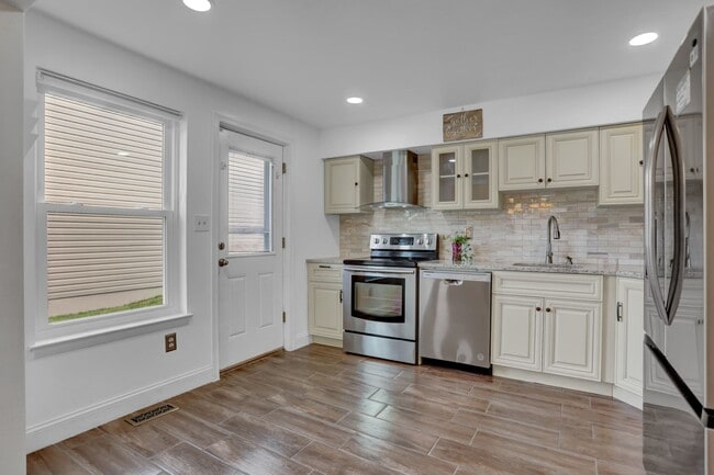 Building Photo - Charming Home with Modern Upgrades and Out...