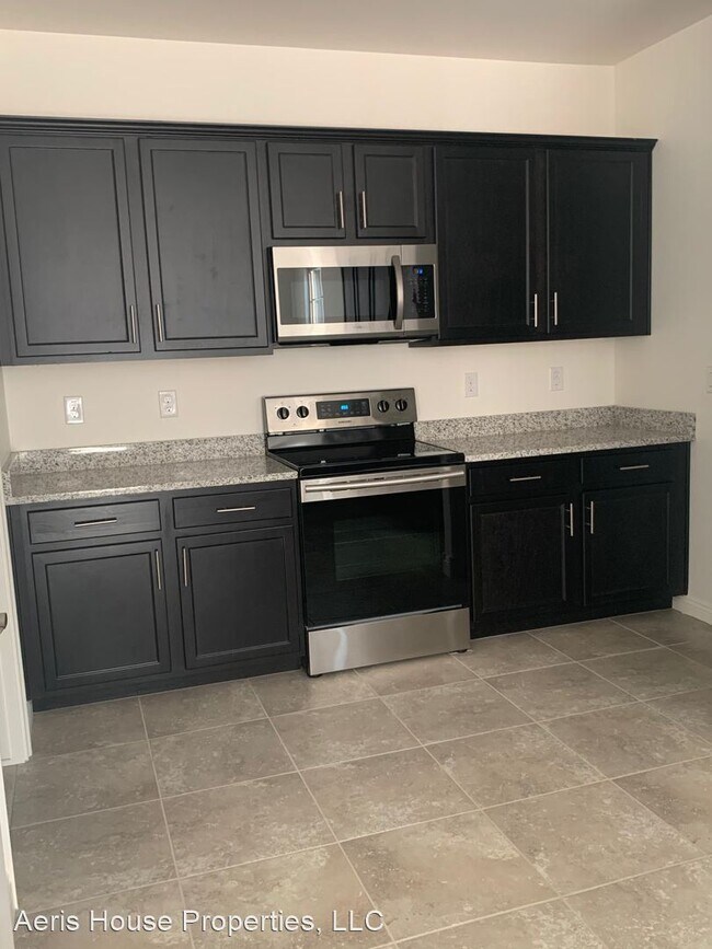 Building Photo - 4 br, 3 bath House - 6846 E Butte St