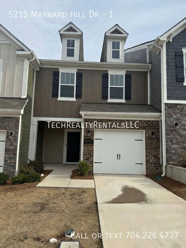 Foto del edificio - 5215 Maynard Hl Dr