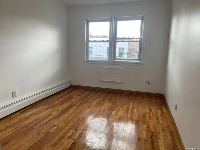 Building Photo - 45-46-46 163rd St