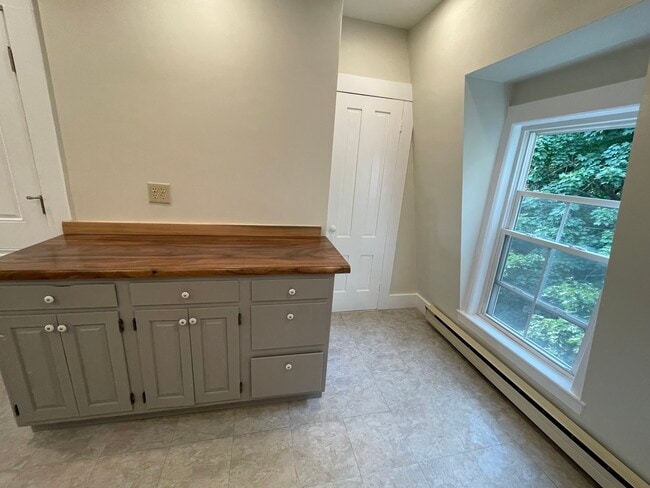 Pantry to the right, rear exit to the left. - 12 Mount Vernon St