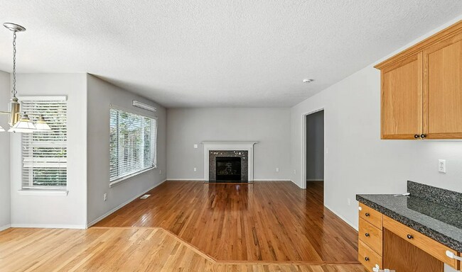 Building Photo - Spacious 4-Bedroom + Den Home with Private...