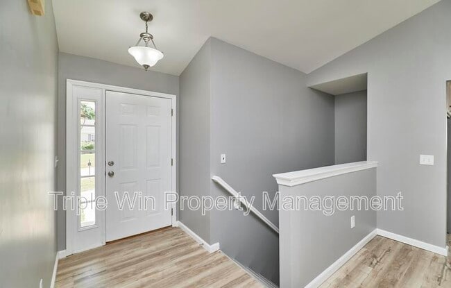Building Photo - 4927 Triple Tree Ct