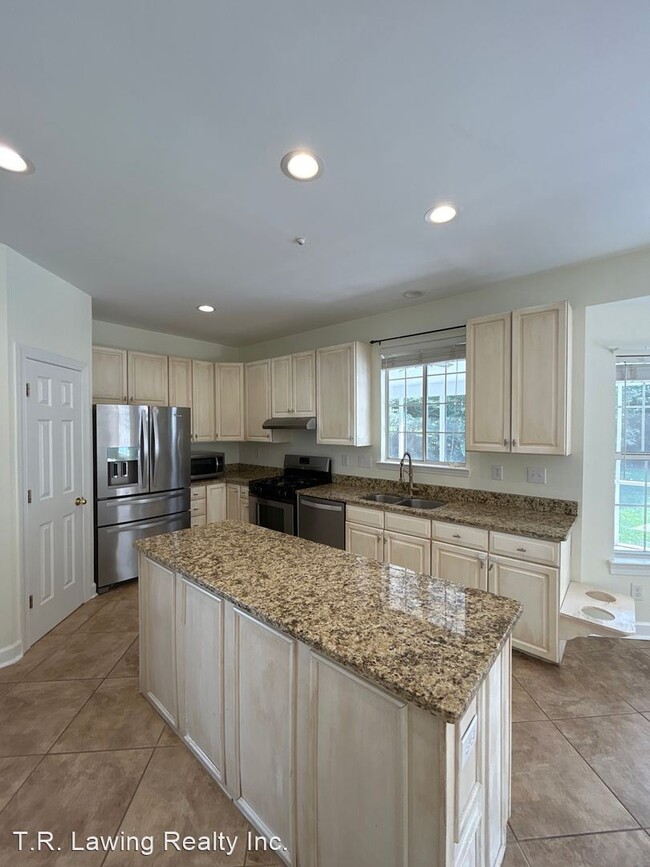 Building Photo - 4 br, 2.5 bath House - 6237 Garamond Court