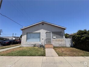 Building Photo - 1049 W 65th Pl