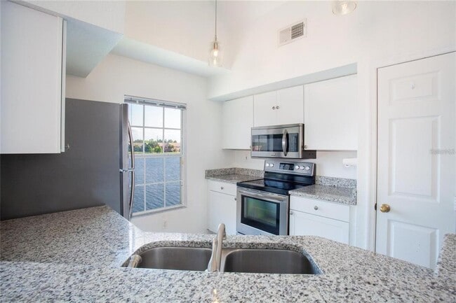 Building Photo - 9704 Lake Chase Island Way