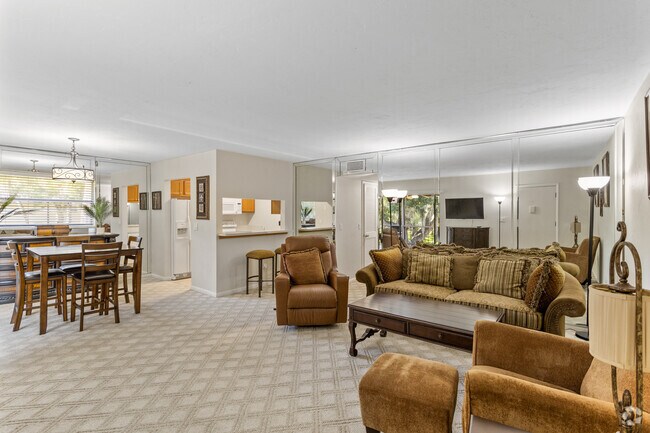 2BR, 2BA - 1040SF - Living Room & Dining Room - Taylor Creek Condominiums