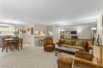 2BR, 2BA - 1040SF - Living Room & Dining Room - Taylor Creek Condominiums
