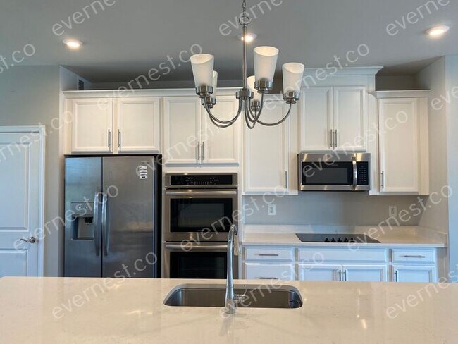 Building Photo - Beautiful 3 Story Townhome - THE LANDING A...