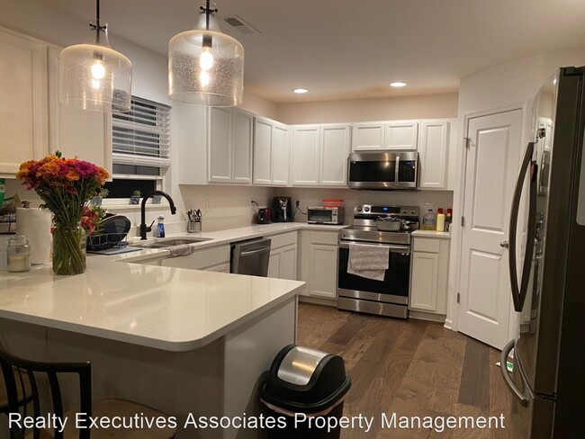 Building Photo - 4 br, 3 bath House - 7723 Lobetti Landing ...